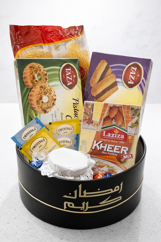 Assorted food items including cookies, tea, and a mix in a black container on a white background
