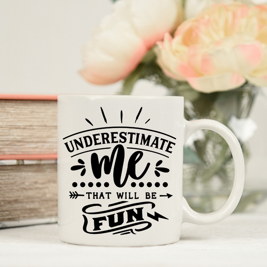 'Underestimate Me' mug